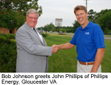 Bob Johnson greets John Phillips of Phillips Energy, Gloucester VA